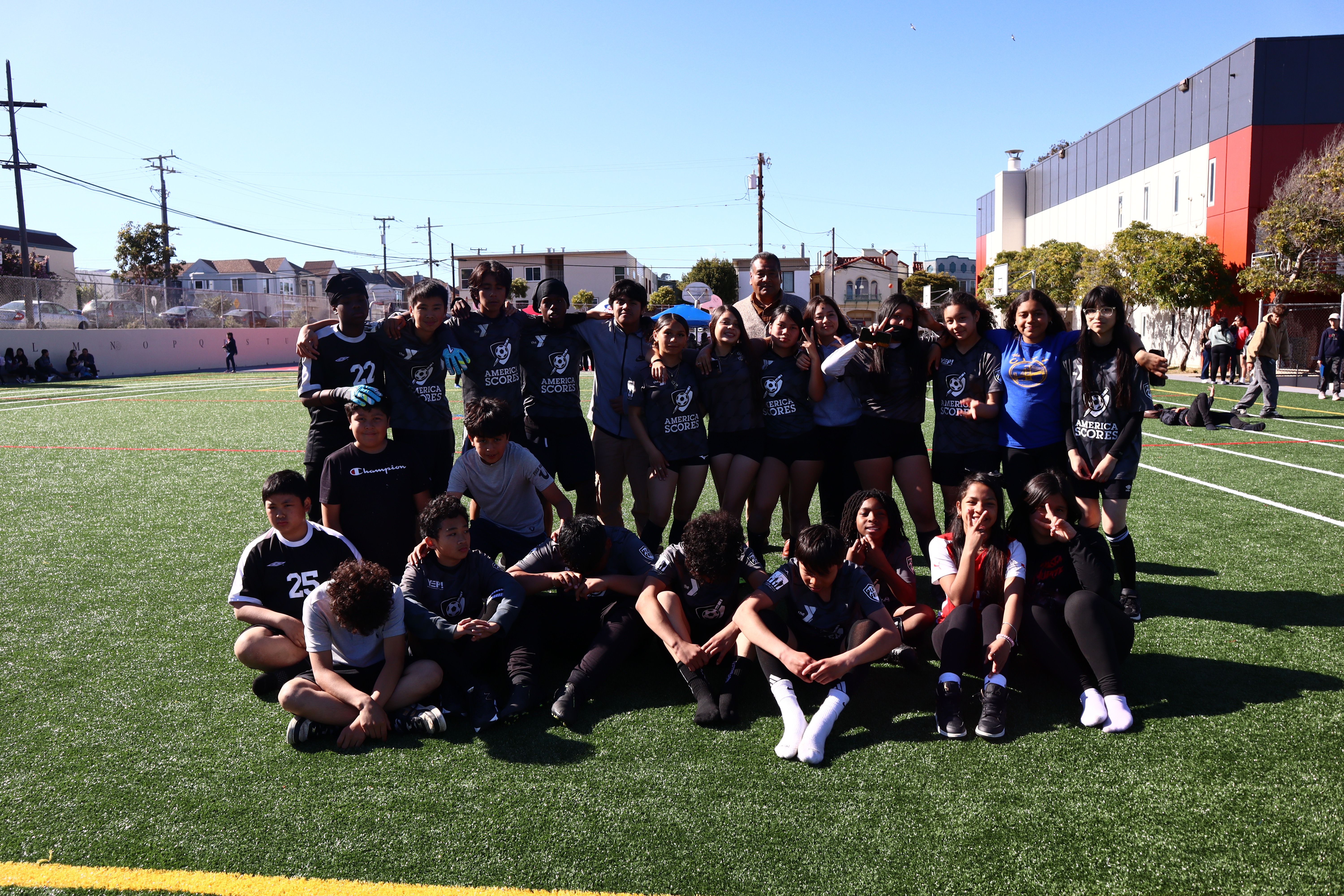 Students gathered on the MLK field during community programming.
